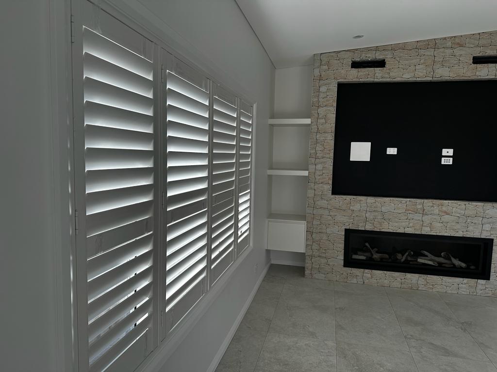 Premium custom blockout roller blinds installed perfectly in a modern Sydney home