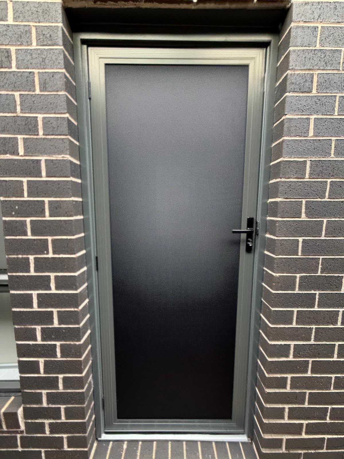 Secure, heavy-duty custom front entry security door on a modern Sydney home