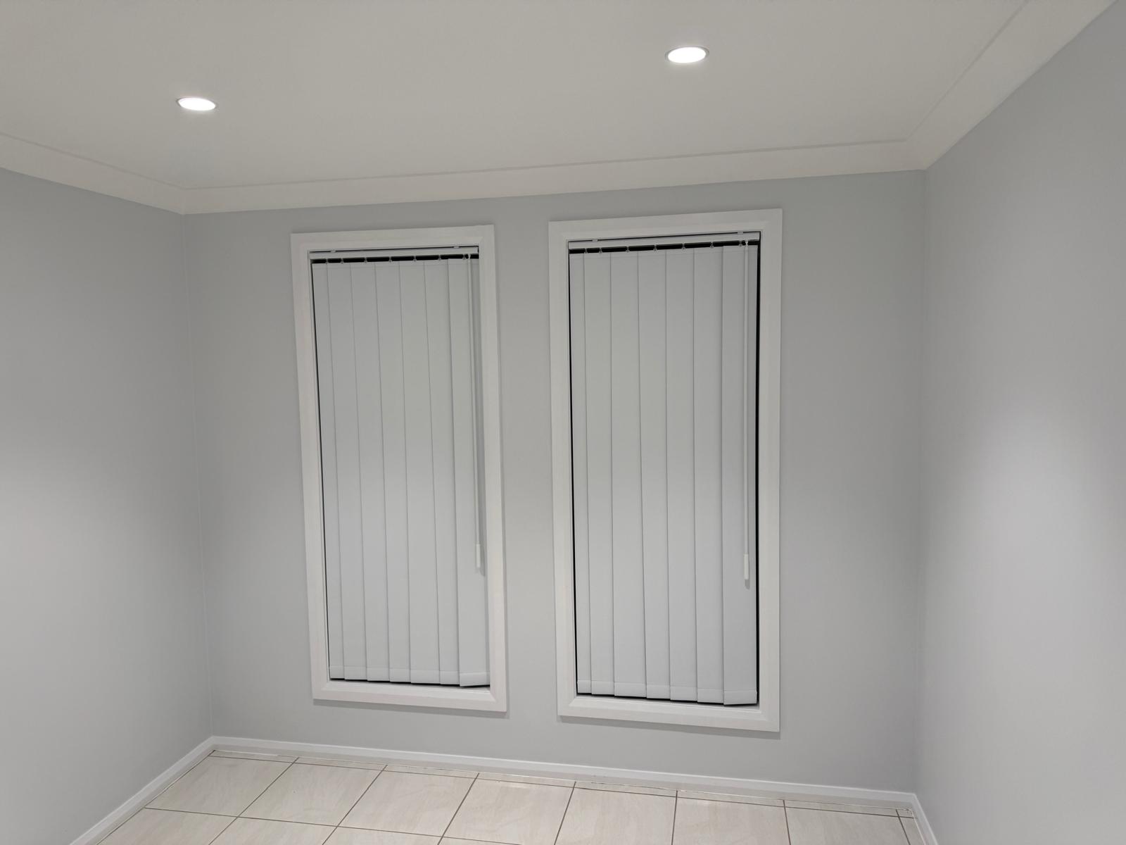 Premium custom vertical blinds installed perfectly in a modern Sydney home